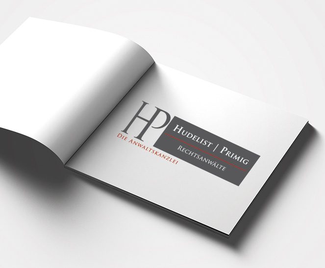 Ein Buch zeigt das Logo des Kunden Hudelist/Primig Rechtsanwälte, welches von der Werbeagentur Werbereich OG erstellt wurde.